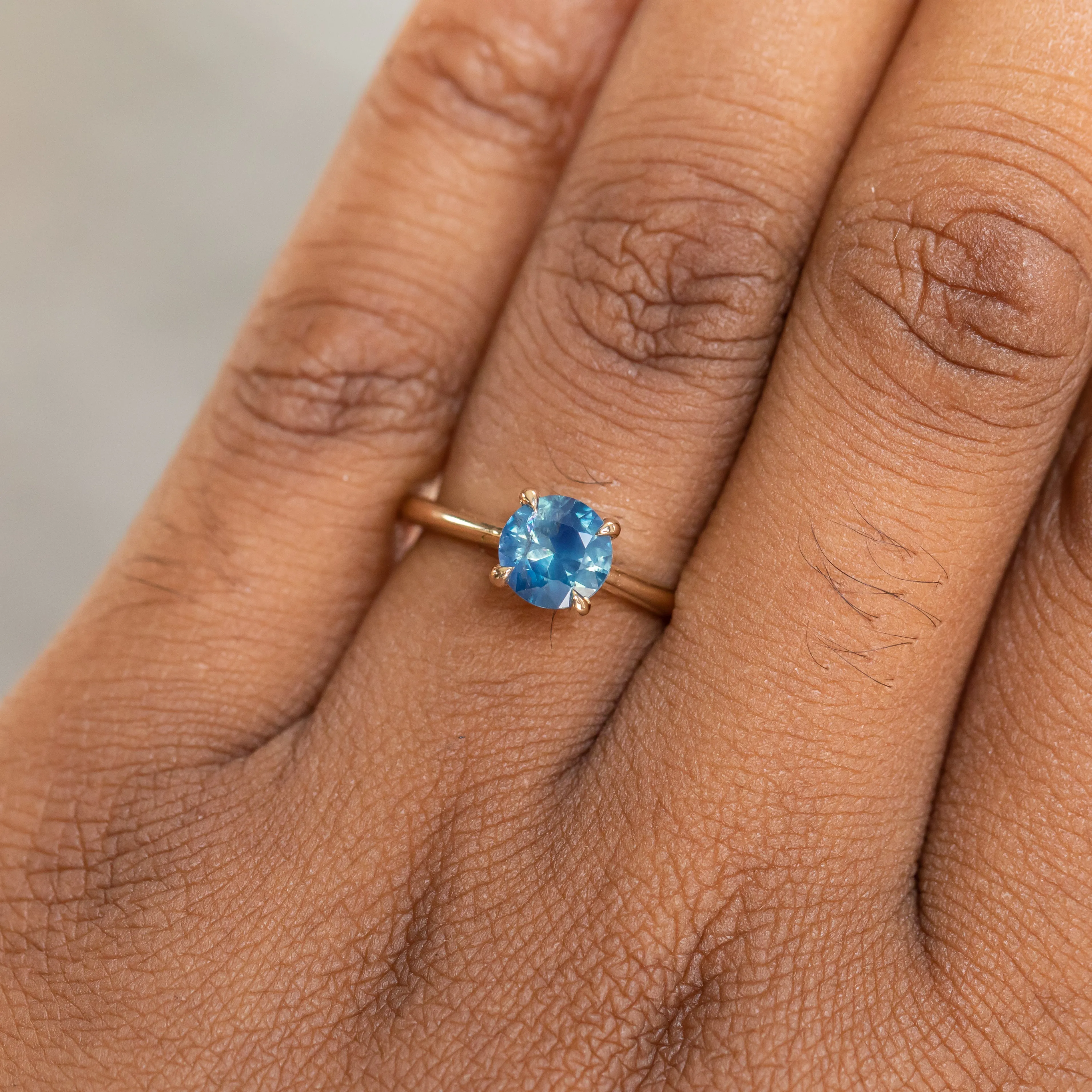 1.26ct Round Nigerian Sapphire Hidden Halo Solitaire in 14k Yellow Gold