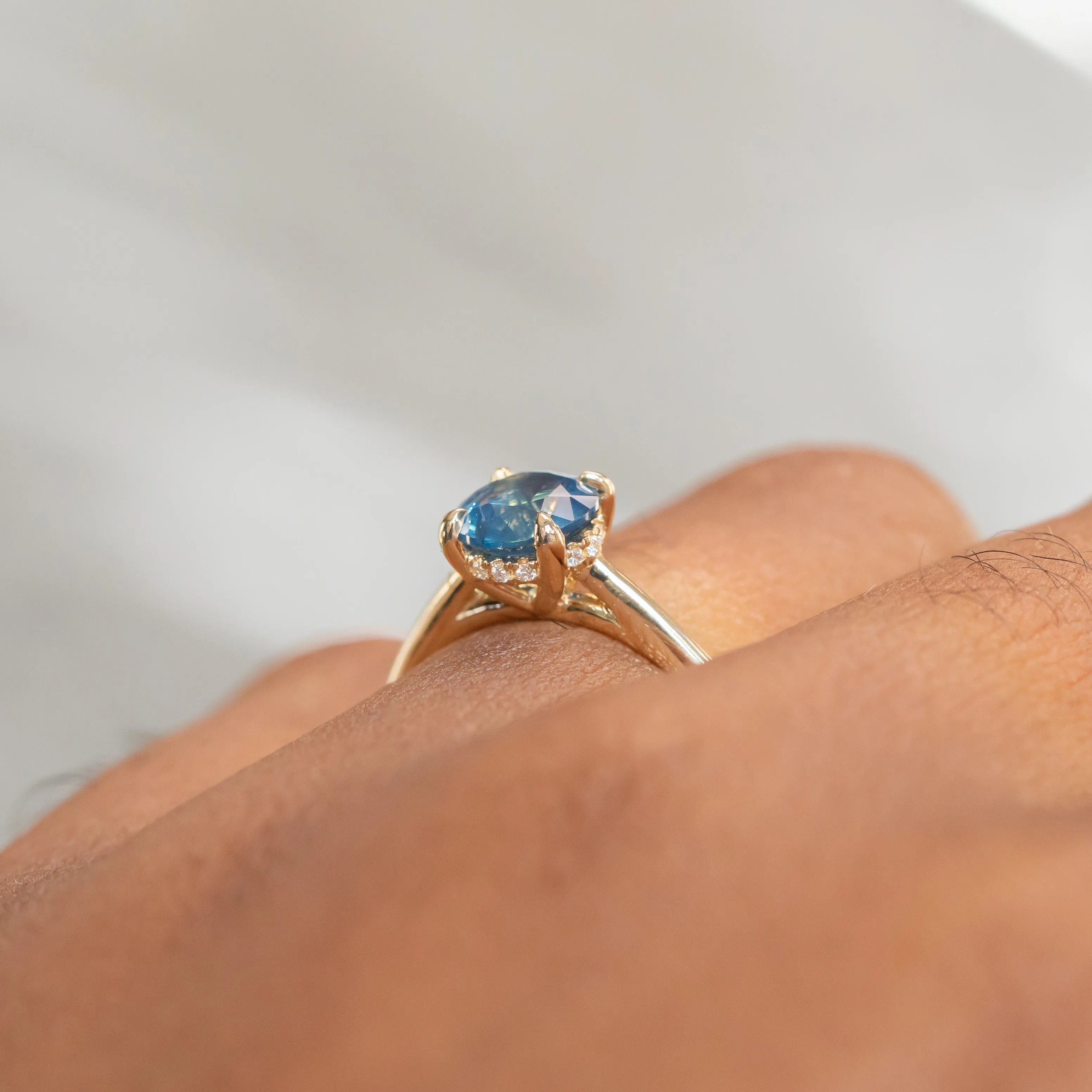 1.26ct Round Nigerian Sapphire Hidden Halo Solitaire in 14k Yellow Gold